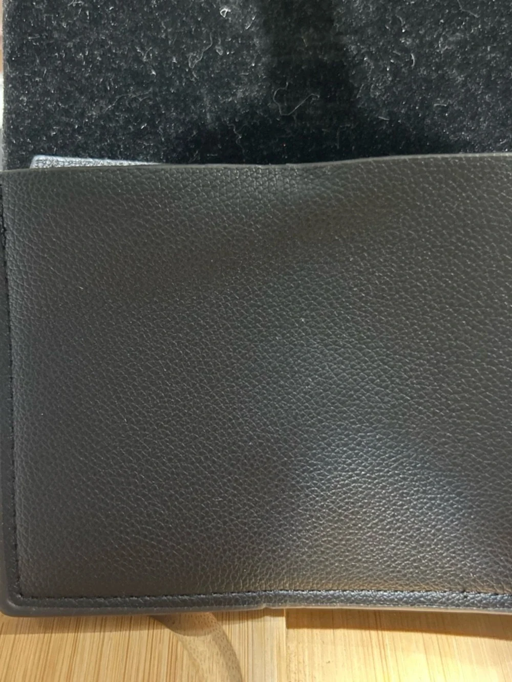 Black Leather Men’s Wallet have some wrinkle in the top